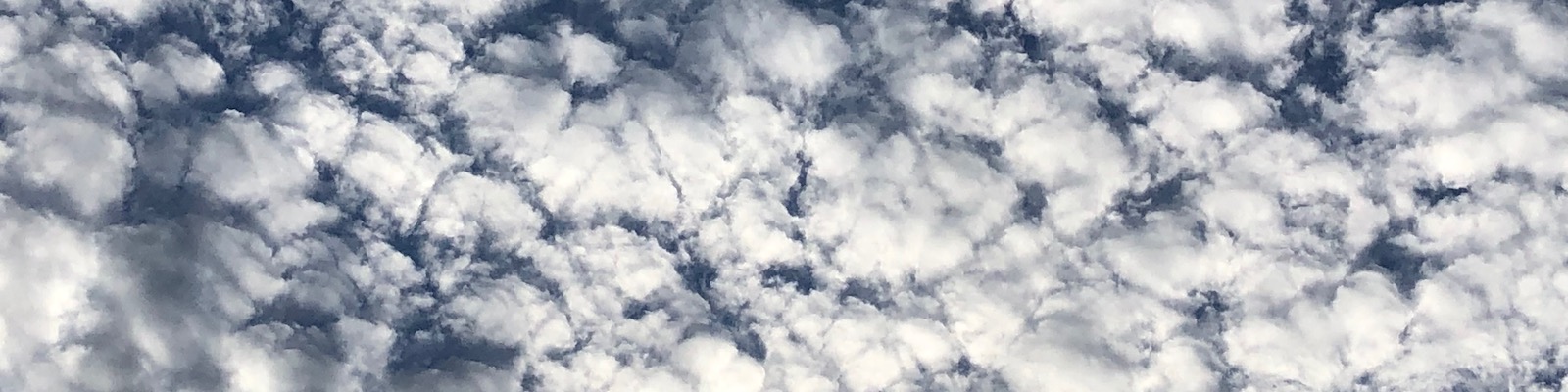 White clouds in the sky

Description automatically generated with medium confidence